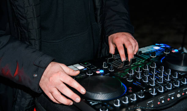 istock DJ Set: DJ Hands And DJ Desk 1371934857