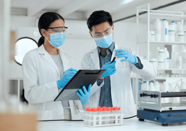 istock Shot of two scientists reviewing a test sample together 1371935209