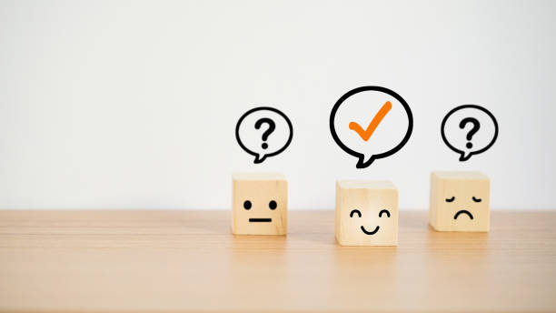 istock correct sign over the happy face icon on wood cube with blurred others 1371935271