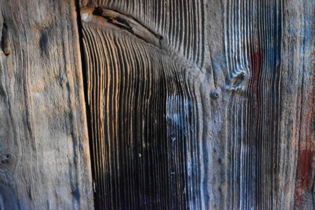 istock Close up on weather beaten wood material - plank. 1371936477