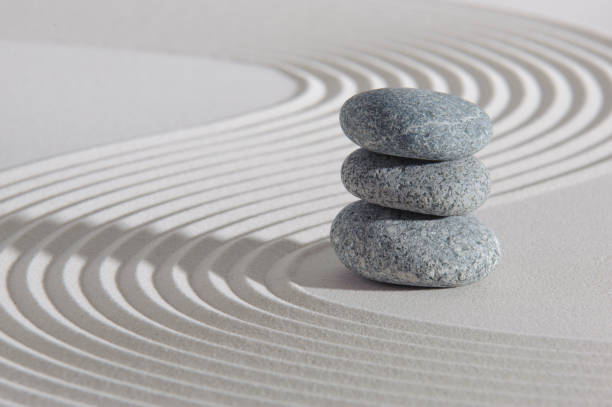 istock Japanese zen garden with stones in sand 1371936613