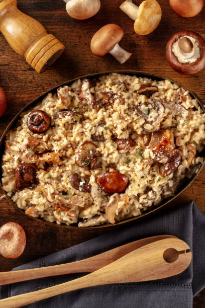 istock Risotto ai funghi, mushroom risotto, rustic rice with mushrooms 1371937700