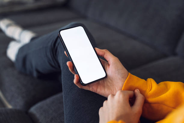 istock Unrecognizable woman looking at her phone 1371943716