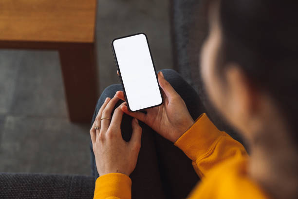 istock Unrecognizable woman looking at her phone 1371943723