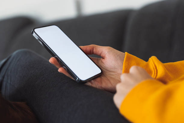 istock Unrecognizable woman looking at her phone 1371943727