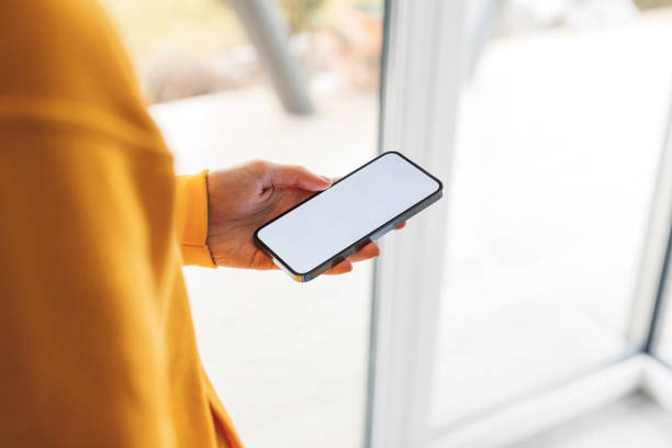 istock Unrecognizable woman looking at her phone 1371943740