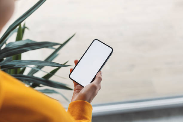 istock Unrecognizable woman looking at her phone 1371943745