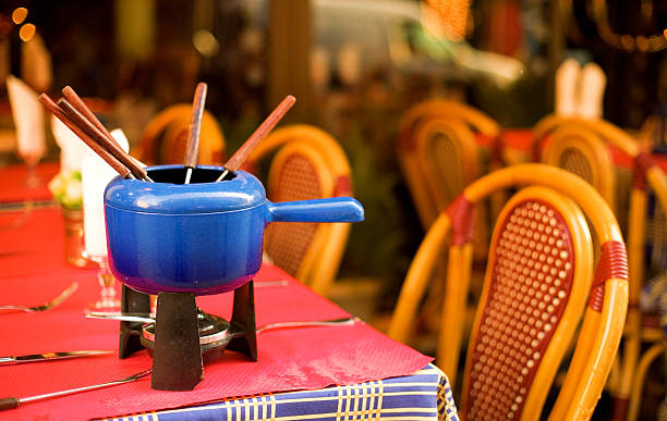 istock Parisian street cafe with earthenware pot for fondue 137194464