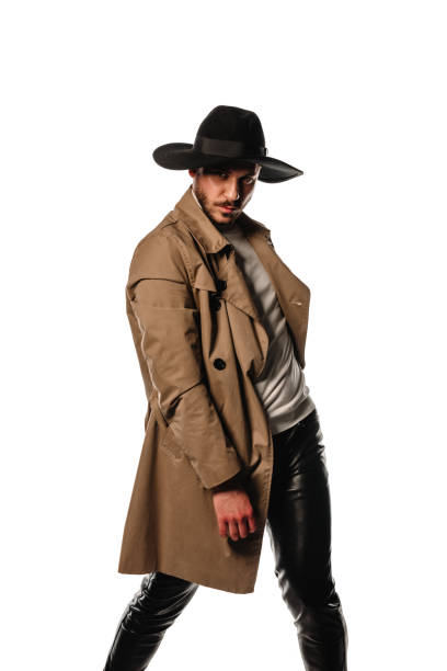 istock Trendy young guy with cowboy hat 1371945181