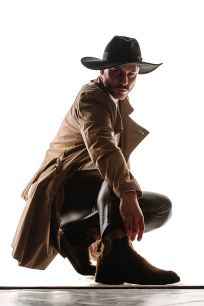istock Trendy young guy with cowboy hat 1371945187