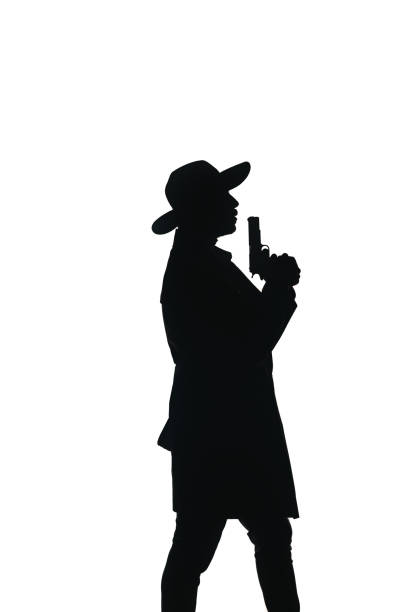 istock Modern detective costume silhouette 1371945214