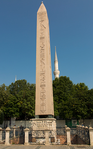 Istanbul, Turkey - July 19, 2021: Theodosius Obelisk (Egyptian Obelisk) in the historical Sultanahmet Square, the oldest ancient structure in Istanbul. Tourism, Istanbul and history concepts. Vertical close-up.