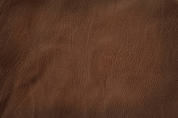 fondo de textura de cuero marrón oscuro con patrón sin costuras y alta resolución. - pattern hide beige textured fotografías e imágenes de stock
