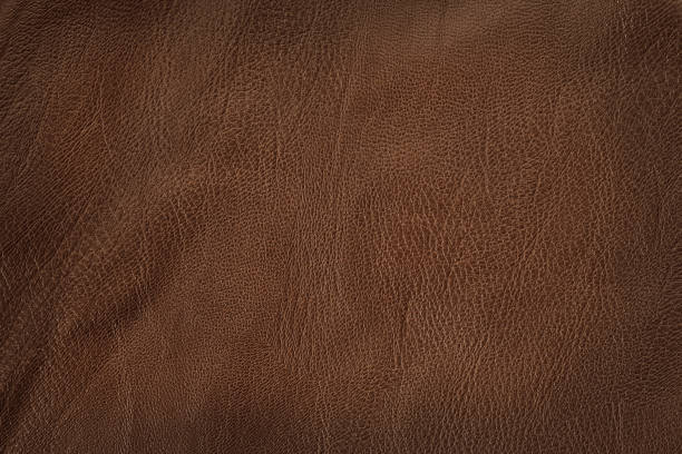 fond de texture en cuir brun foncé avec motif sans couture et haute résolution. - leather photos et images de collection