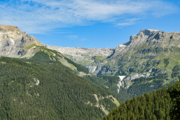Beautiful view on Lac de Tseuzier and surrounding mountains close to Crans Montana Beautiful view on Lac de Tseuzier and surrounding mountains close to Crans Montana in Switzerland crans montana stock pictures, royalty-free photos & images
