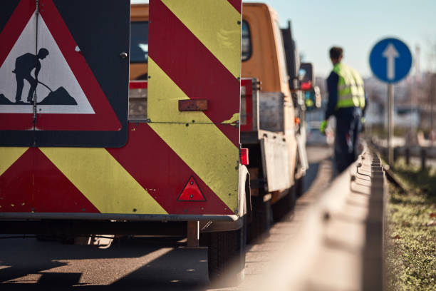 istock Public road work and closure sign. 1371957013