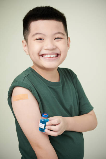istock Asian little boy getting vaccination 1371958778