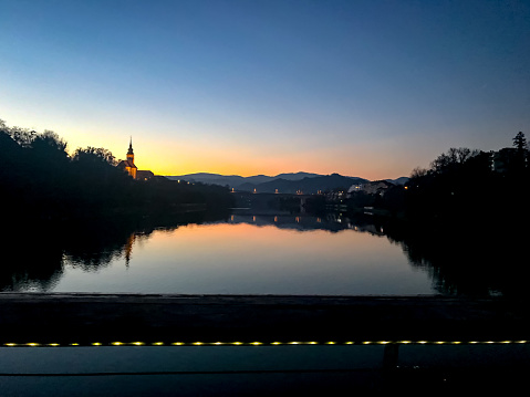 Sunset over the Drava river in city Maribor, Slovenia