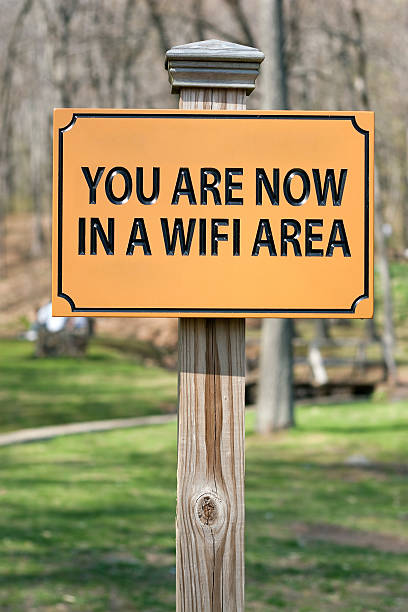 WIFI Hotspot Sign A sign that reads YOU ARE NOW IN A WIFI AREA indicating a wireless hotspot for internet use. wisconsin road signs stock pictures, royalty-free photos & images