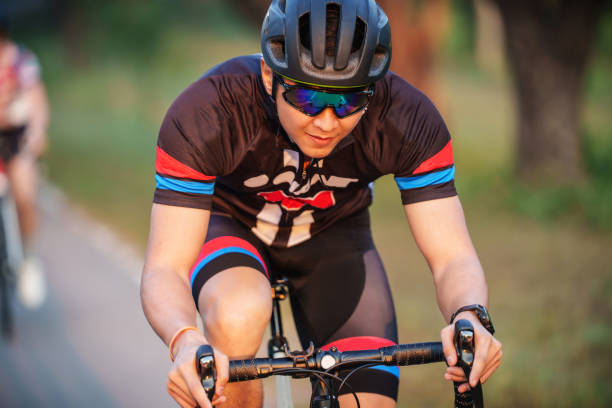 istock close up cyclist action in the racing road 1371966643