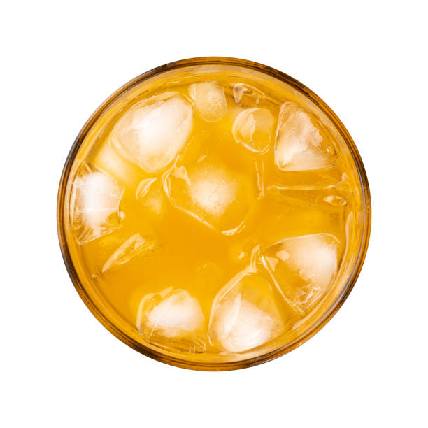 istock Orange soda, soft drink in a cup with ice, top view isolated over white background 1371967567