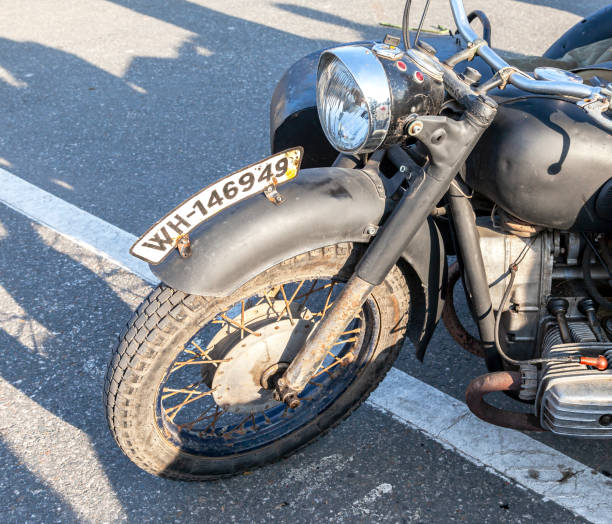 Samara, Russia - November 9, 2013: Old german retro motorcycle from the second world war with a license plate on the fender of the front wheel