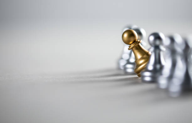istock Gold and silver chess figures standing 1371967781
