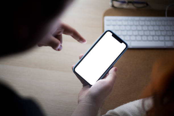 istock High angle view of an unrecognizable Caucasian man using a smart phone at home 1371969033