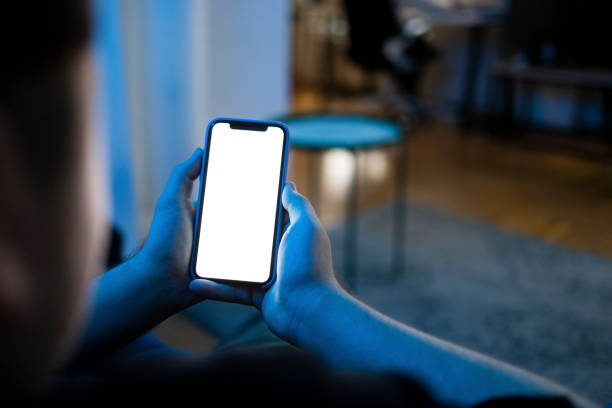 istock High angle view of an unrecognizable Caucasian man using a smart phone at home 1371969107