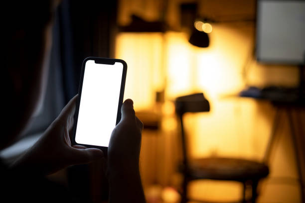 istock High angle view of an unrecognizable Caucasian man using a smart phone at home 1371969111