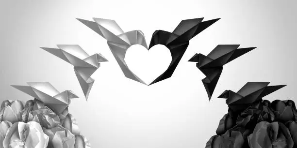 Joining together for love as an inclusiveness symbol and racial harmony as black and white origami birds connecting  in a 3D illustration style.