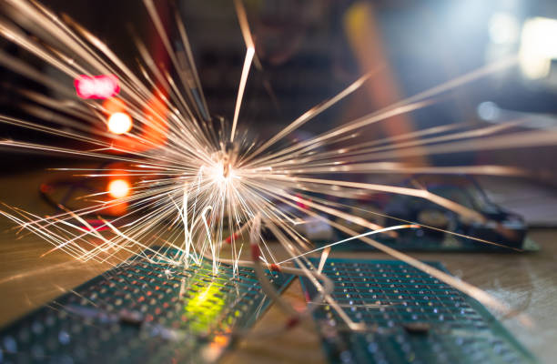 istock Microcircuit for TFT with wires sparkles with electric sparks 1371972706