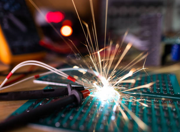 istock Microcircuit for TFT with wires sparkles with electric sparks 1371972753