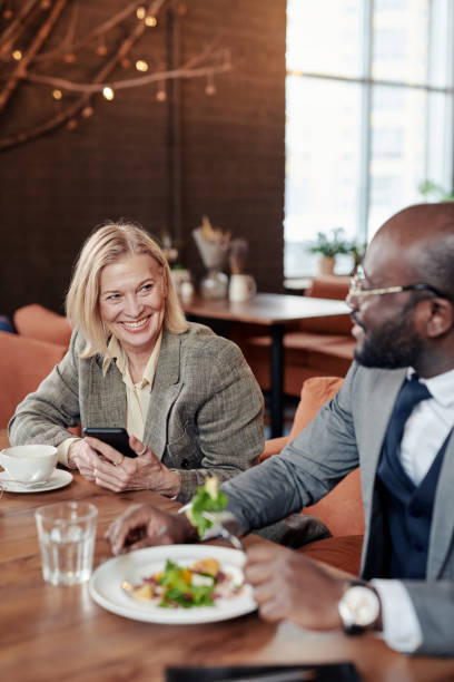 istock Business colleague having lunch at restaurant 1371978868