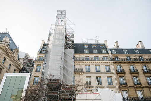 Apartment building with scaffolding in Paris, France