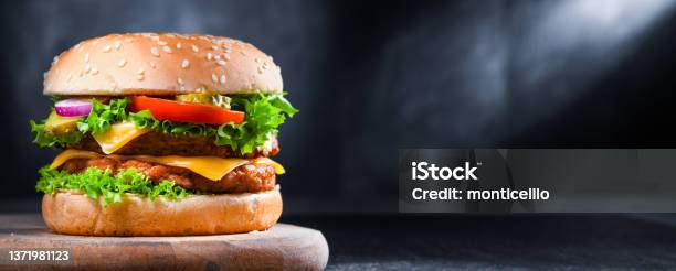 Hamburger With Cheese And Fresh Vegetables Stock Photo - Download Image Now - Burger, Hamburger, Beef