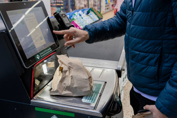 istock Weighing his Groceries to Check Out 1371981300