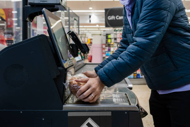 istock Checking out his Groceries 1371981377
