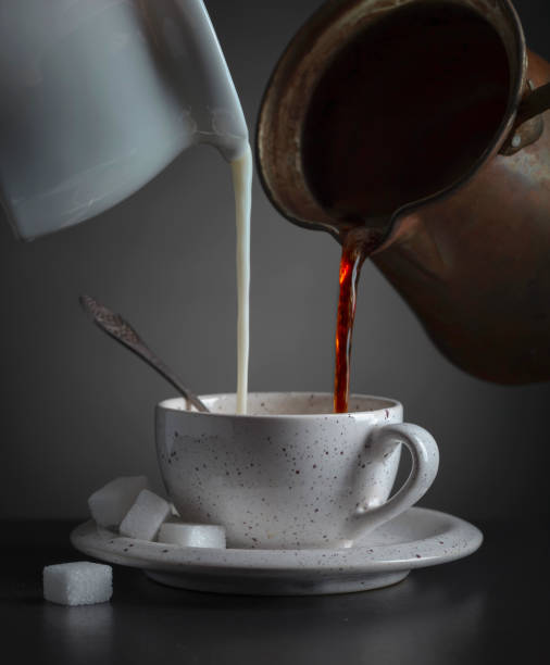 istock Cup of coffee with cream and sugar. 1371981896