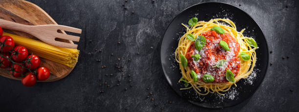 istock Composition with a plate of spaghetti bolognese 1371983907