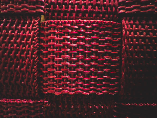 A braided, pink fabric as texture or background.