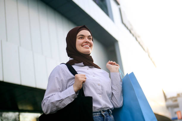 istock Arab woman shopping 1371985437