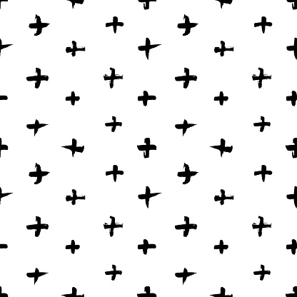 Vector seamless pattern with black crosses. Abstract background with brush strokes. Hipster monochrome texture. Geometric grunge background. Hand drawn cross and plus sign. Trendy graphic design.