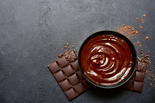 istock Homemade chocolate ganache. Top view with copy space. 1371988560
