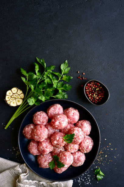 istock Homemade raw meat ball. Top view with copy space. 1371989115