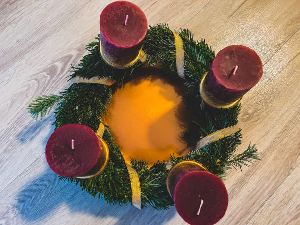 istock An Advent wreath on a wooden floor. 1371991187