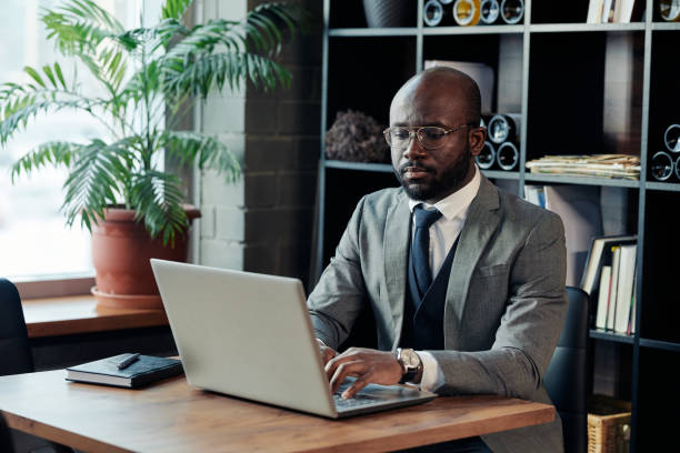 istock Businessman working on laptop at the restaurant 1371991235