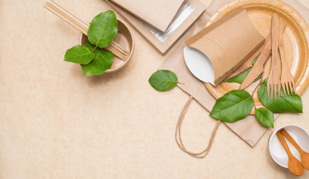 istock Eco friendly different food containers from paper, biodegradable tableware on paper background with copy space. Plastic free. Zero waste. 1371994863