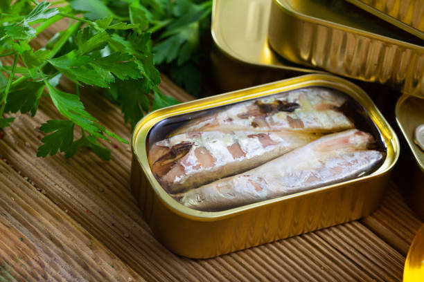 istock Preserved mackerel fish on wooden table 1371996157