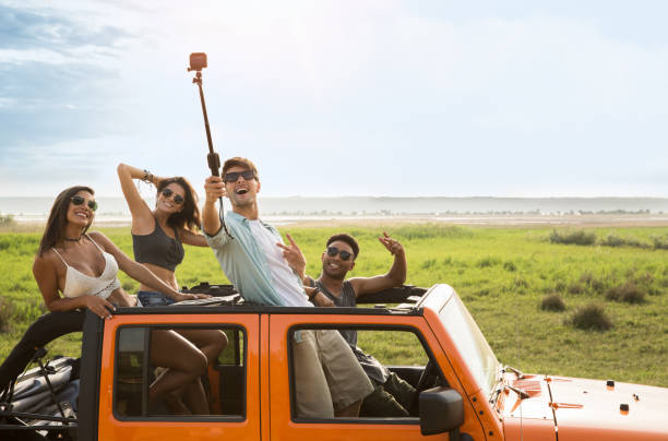 istock Happy group of friends taking selfie 1371996850
